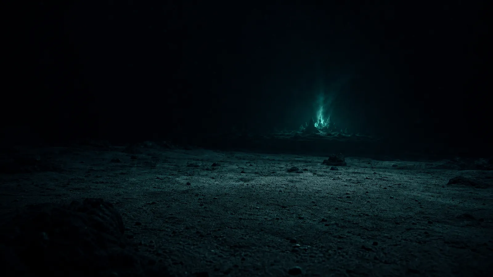 The abyssal plain, faintly lit, utterly still